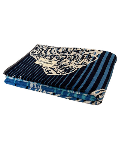 XXL Strandtuch mit maritimem Muster in Blau – Seepferdchen, Seesterne und Muscheln, gefaltet mit Logo – Ischia Kollektion von Dolcefrotto